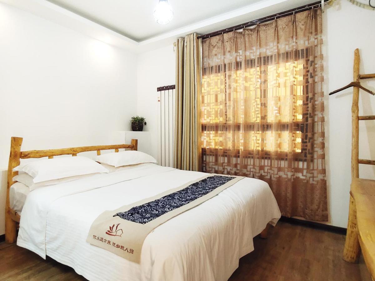 Dunhuang Silk Yododo Inn Екстер'єр фото